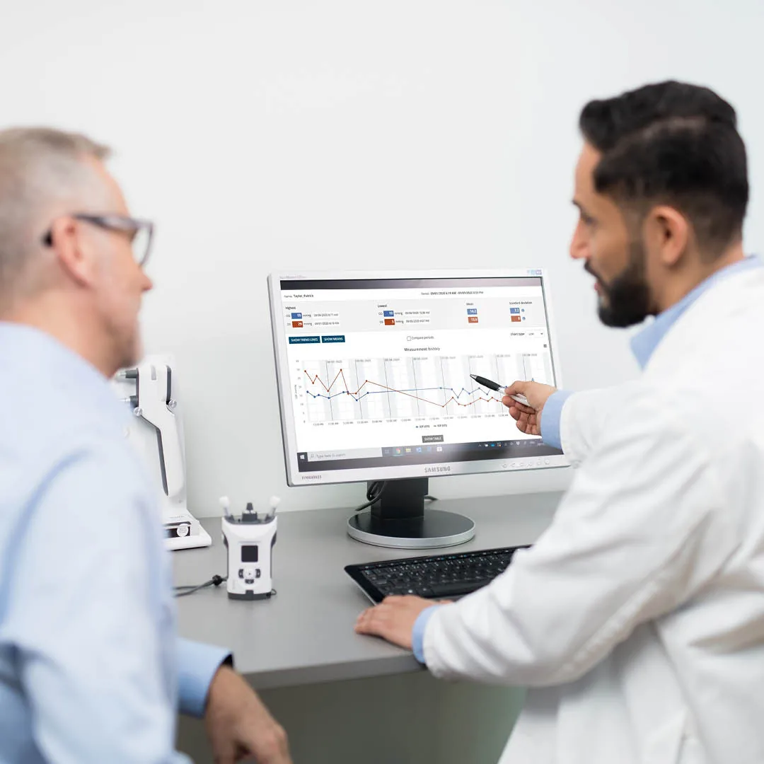 iCare CLINIC cloud reporting platform interface on multiple devices
